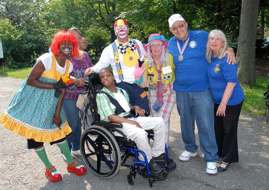 Community Mayors volunteers and special needs child at a Community Mayors Special Event