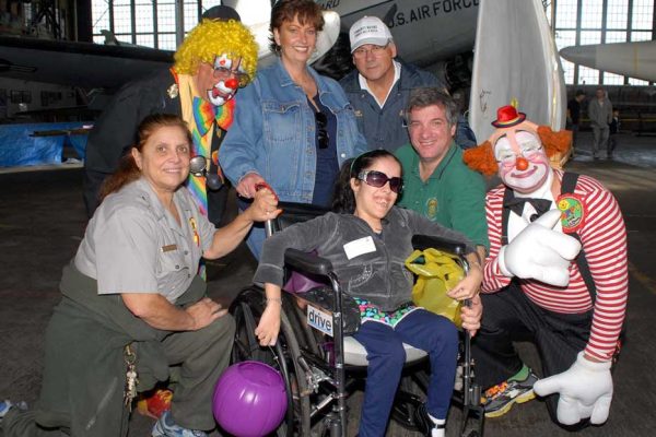 Community Mayors volunteers and child at Halloween Hayride Event