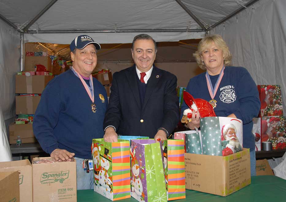 Community Mayors volunteers packing gifts at Operation Santa Claus event