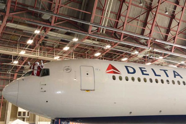 Santa arriving to JFK International Airport via Delta Air Lines plane